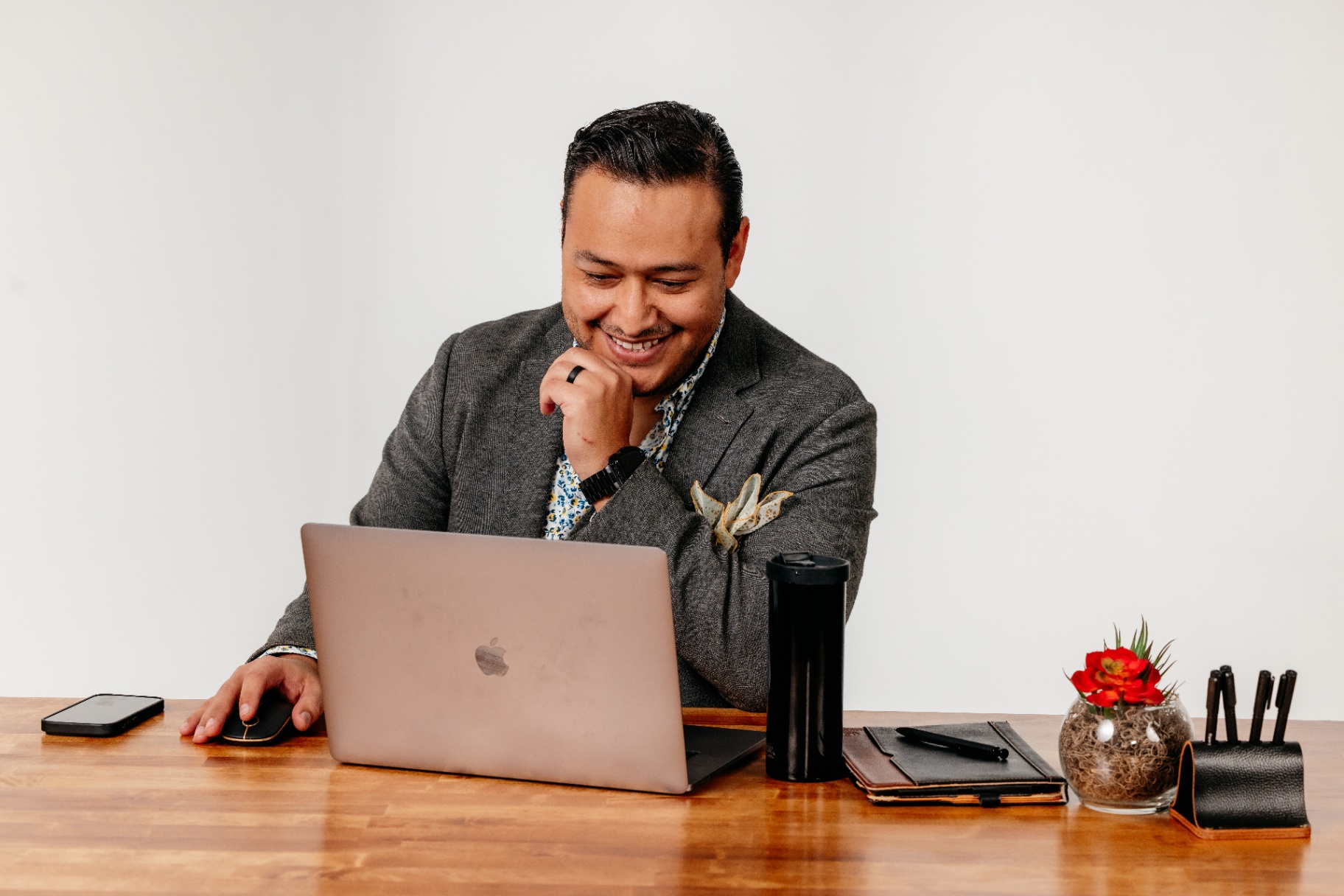 Agency owner working at desk with infrastructure already in place